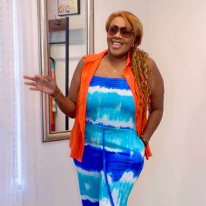 Orange Sleeveless Shirt Only Worn Once for Promotional Purposes